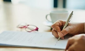 Professional signing a contract